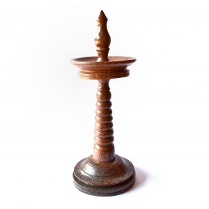 Traditional lamp of Kerala made in wood of coconut tree